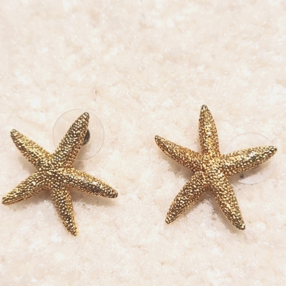 New without tags, star earrings. Gold plated brass, high quality